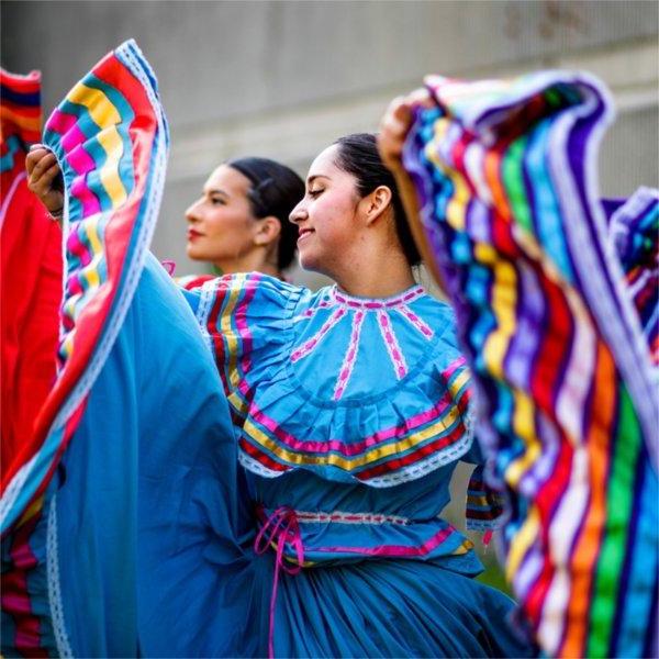 Members of student group Monarcas perform a dance together.