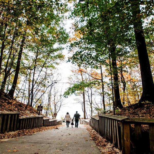 Family walking through park