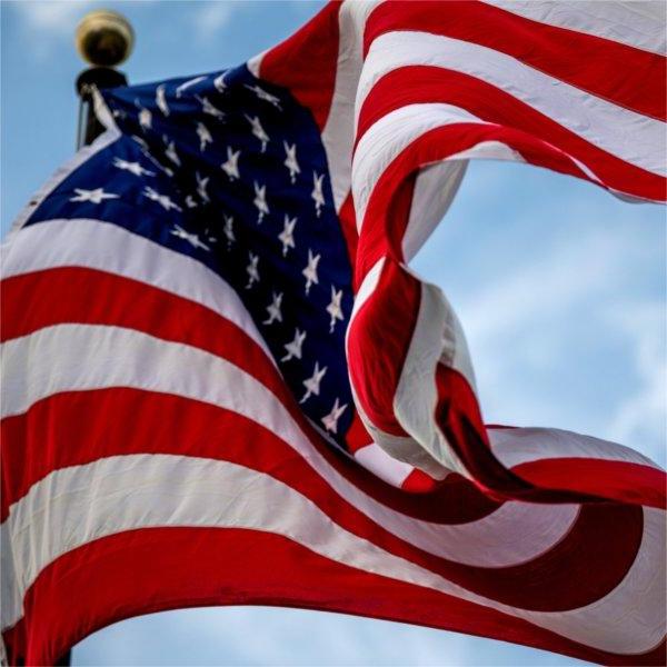 Photo of a U.S. Flag flying at a Lakers football game.