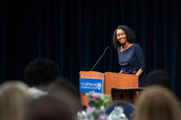 Kyra Harris Bolden speaks from a podium