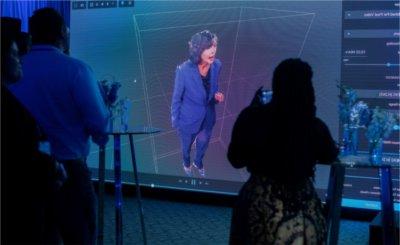 A 3D digital avatar of President Philomena V. Mantella delivers remarks during The Blue Dot Experience event.