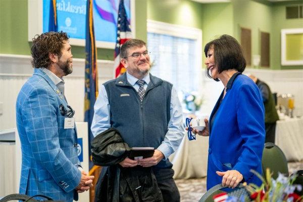 President Philomena V. Mantella speaks with Brent Holmes, veteran and associate director of the Hauenstein Center for Presidential Studies, and guest speaker Jason Redman, a retired naval offier and former Navy SEAL.