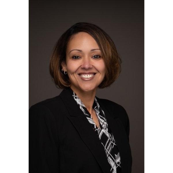 portrait of Alisha Davis in black suit jacket