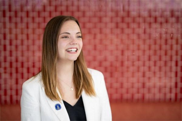 Junior Nancy Hoogwerf poses for a portrait in the Pew Library