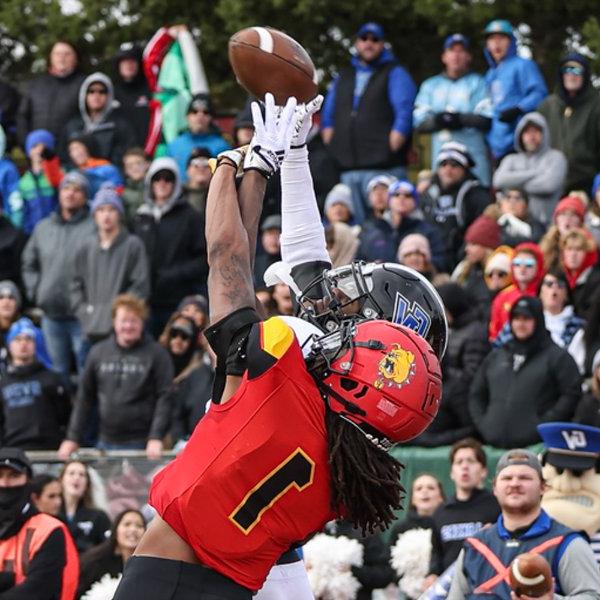 Grand Valley and Ferris State players fight for a pass.