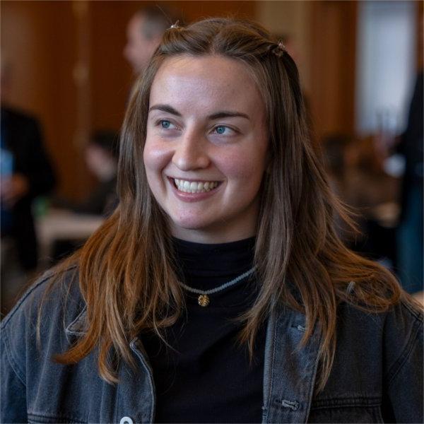 Senior Allie Hawkes smiles during a reception following the ribbon-cutting ceremony, opening the TellerPlus+ Hub in the L. William Seidman Center.