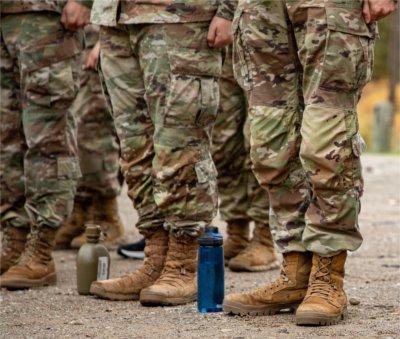 ROTC cadets stand at attention at the start of their lab session.