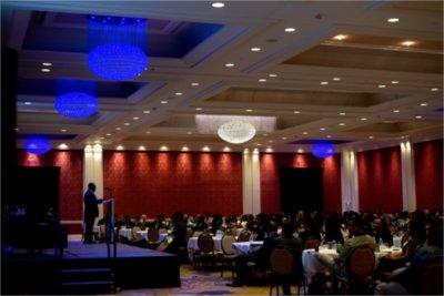 Donta Truss speaks in the Amway Grand Plaza ballroom before a crowd of 400