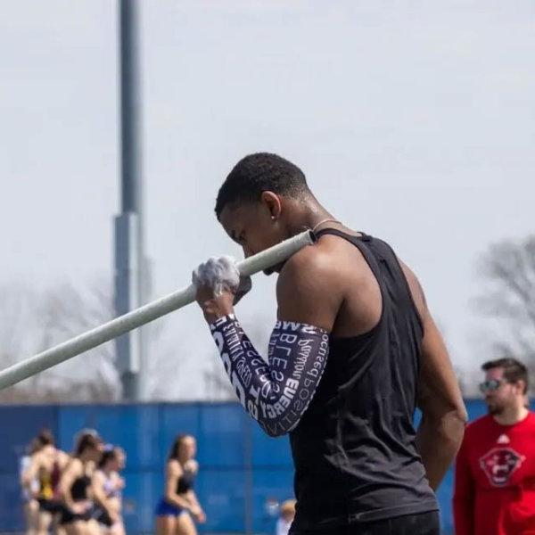 Jaden Blake preparing to pole vault.