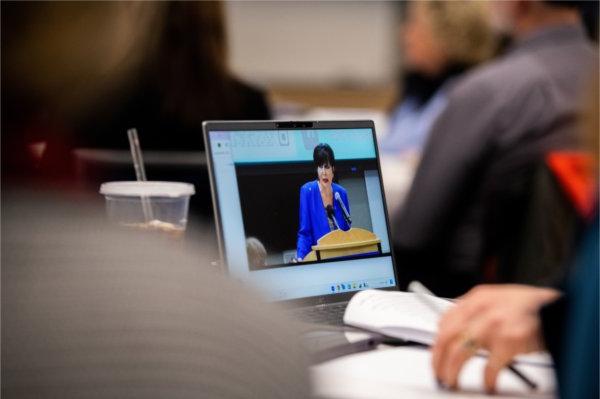 a laptop shows President Mantella delivering remarks 