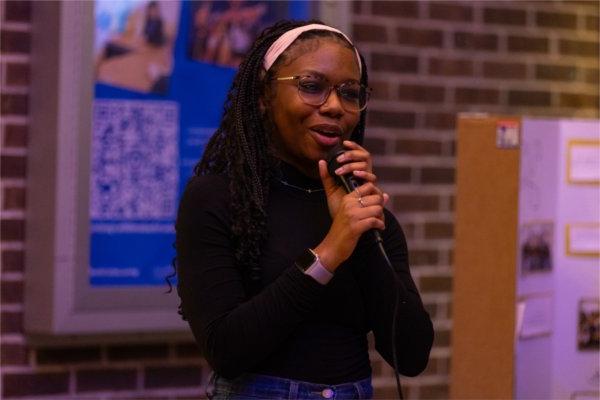 A'Shyah Zander, President of Black Student Union addresses the crowd at GVSU's Blackout Event, Highlighting upcoming events that Black Student Union is hosting.