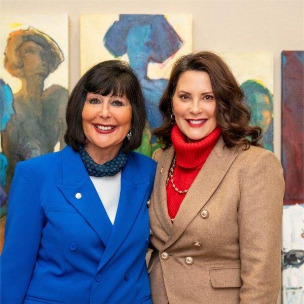 Governor Gretchen Whitmer and Grand Valley President Philomena V. Mantella smile for a photo.