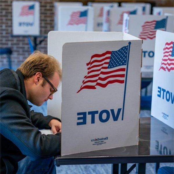 Philosophy major Conrad McIntosh votes at the Kirkhof Center on November 1.