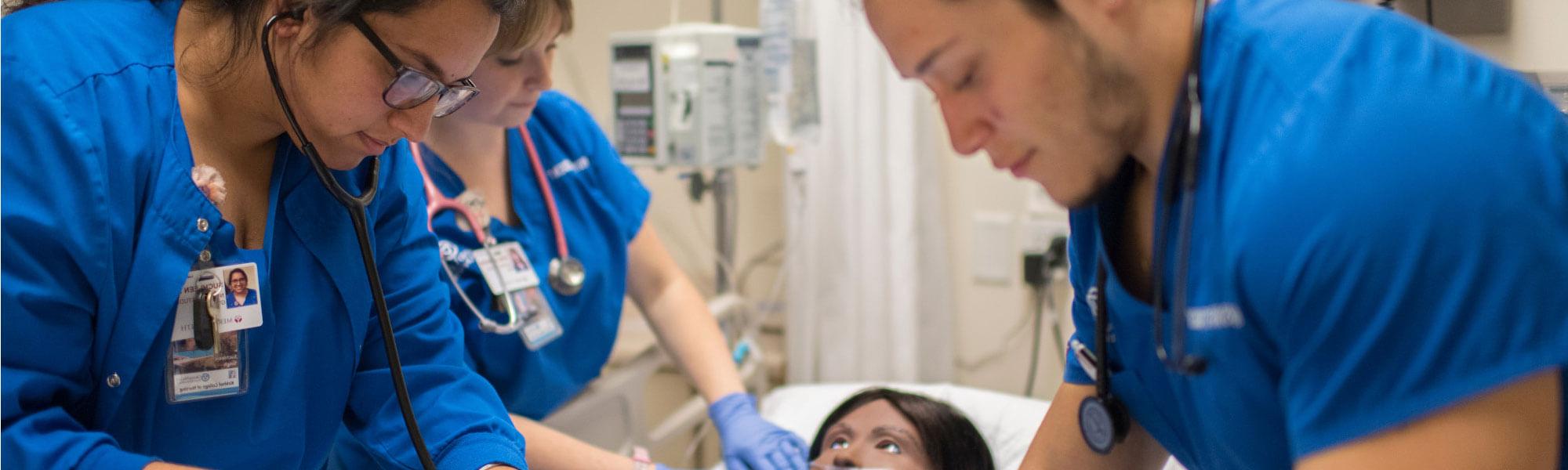 GVSU nursing students in a simulation lab in the Cook-DeVos Center for Health Sciences.