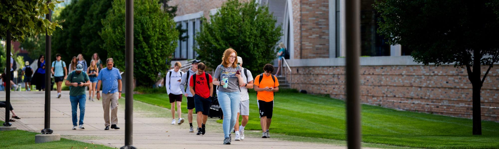 students walking downtown