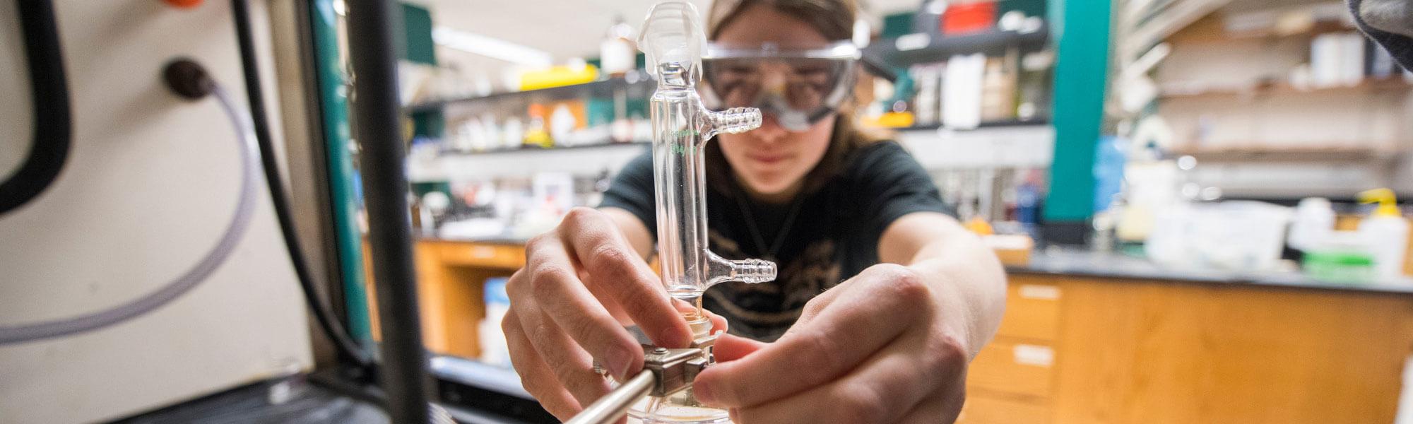 Photo of a Chemistry student in one of GVSU's state-of-the-art chemistry labs.