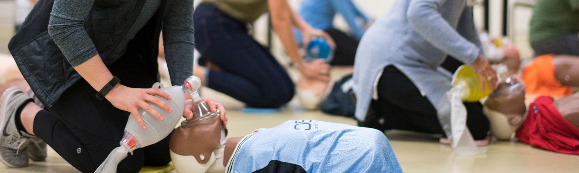 Student practicing CPR.