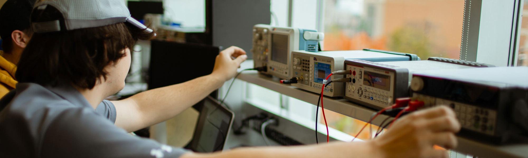 GVSU Engineering students working in an electronics lab.