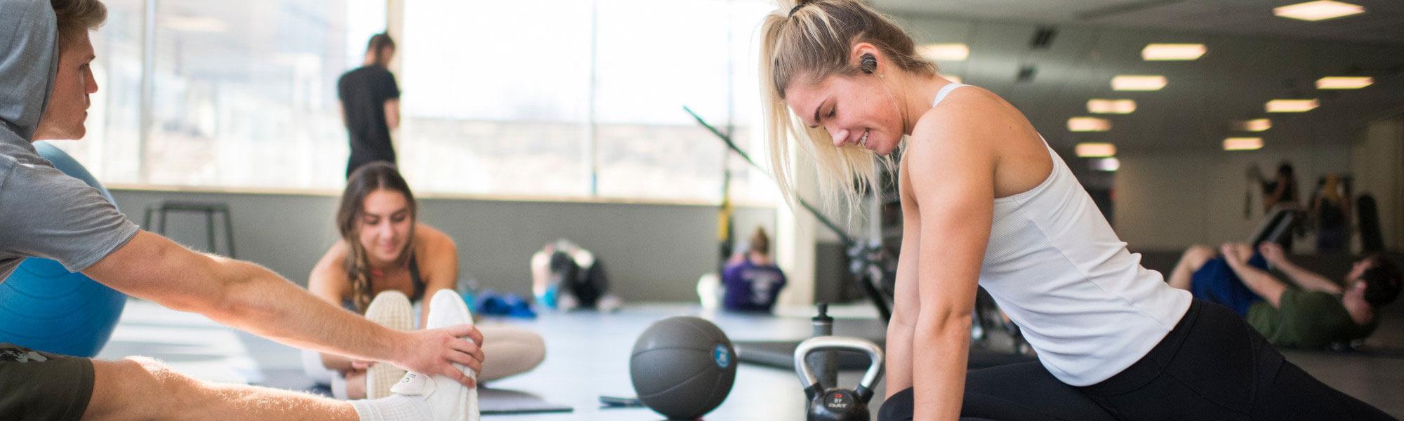 Grand Valley students working out in the rec center.