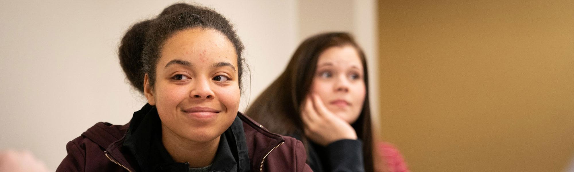 GVSU student in a classroom on the Allendale campus.